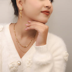 Ethereal Twist Drop Earrings